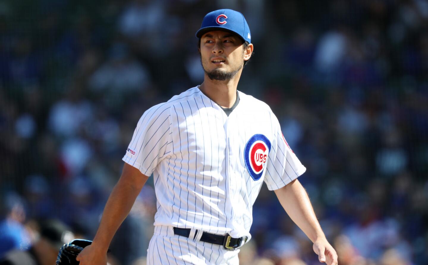 Cubs starter Yu Darvish looks at the video board after throwing the second inning against the Cardinals at Wrigley Field on Saturday, May 4, 2019.
