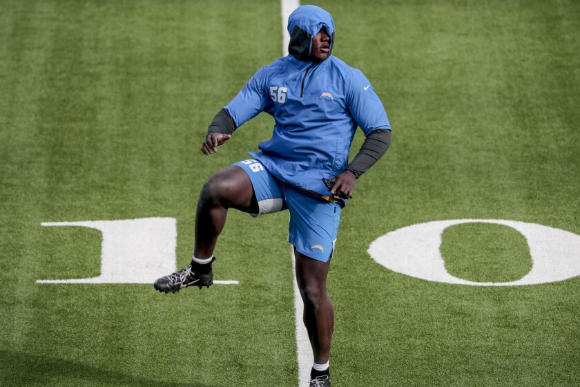 Inglewood, CA, Sunday, Dec. 13, 2020 Los Angeles Chargers outside linebacker Kenneth Murray (56) warms up.