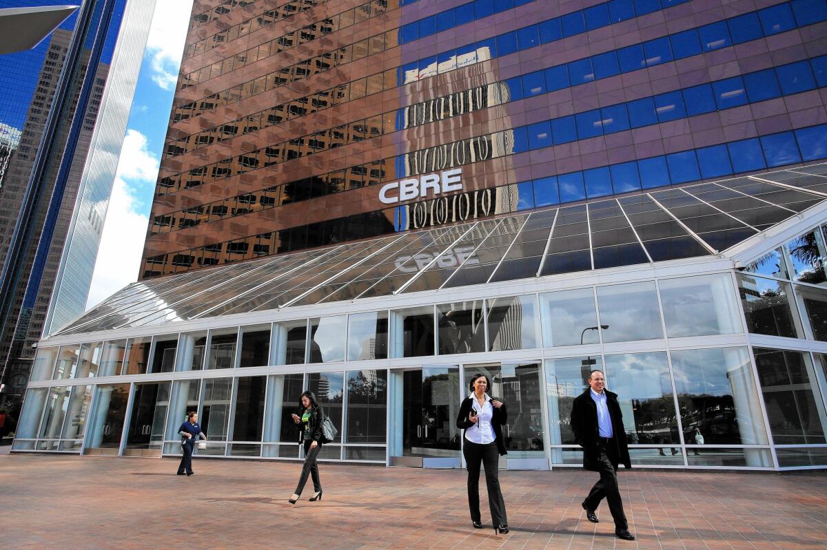 The CBRE Group opens its new headquarters on the top two stories of a 26-story building on Hope Street in downtown Los Angeles.