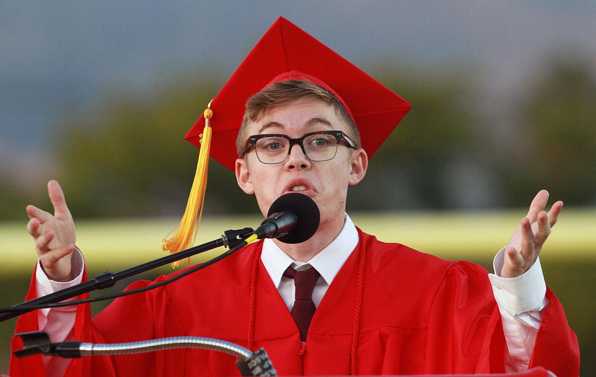 Graduate Nicholas Apostolina presents a speech called "Reminiscence" as he talks about the importance of growing up in high school at the graduation ceremony for Burroughs High School's class of 2016 on Thursday, May 26, 2016.