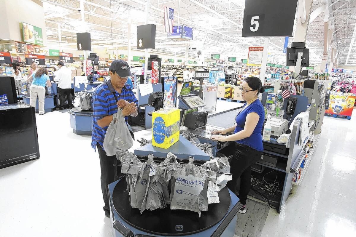 Wal-Mart said GoBank, its mobile checking account, would be available in most of its nearly 4,300 U.S. locations by late October. Above, a store in Pico Rivera.