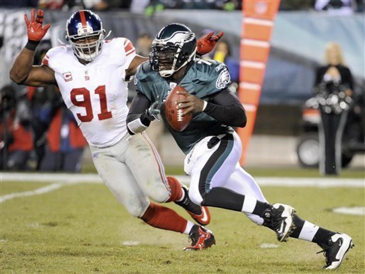 Vick runs for TD, throws INT in Eagles' loss - The San Diego Union