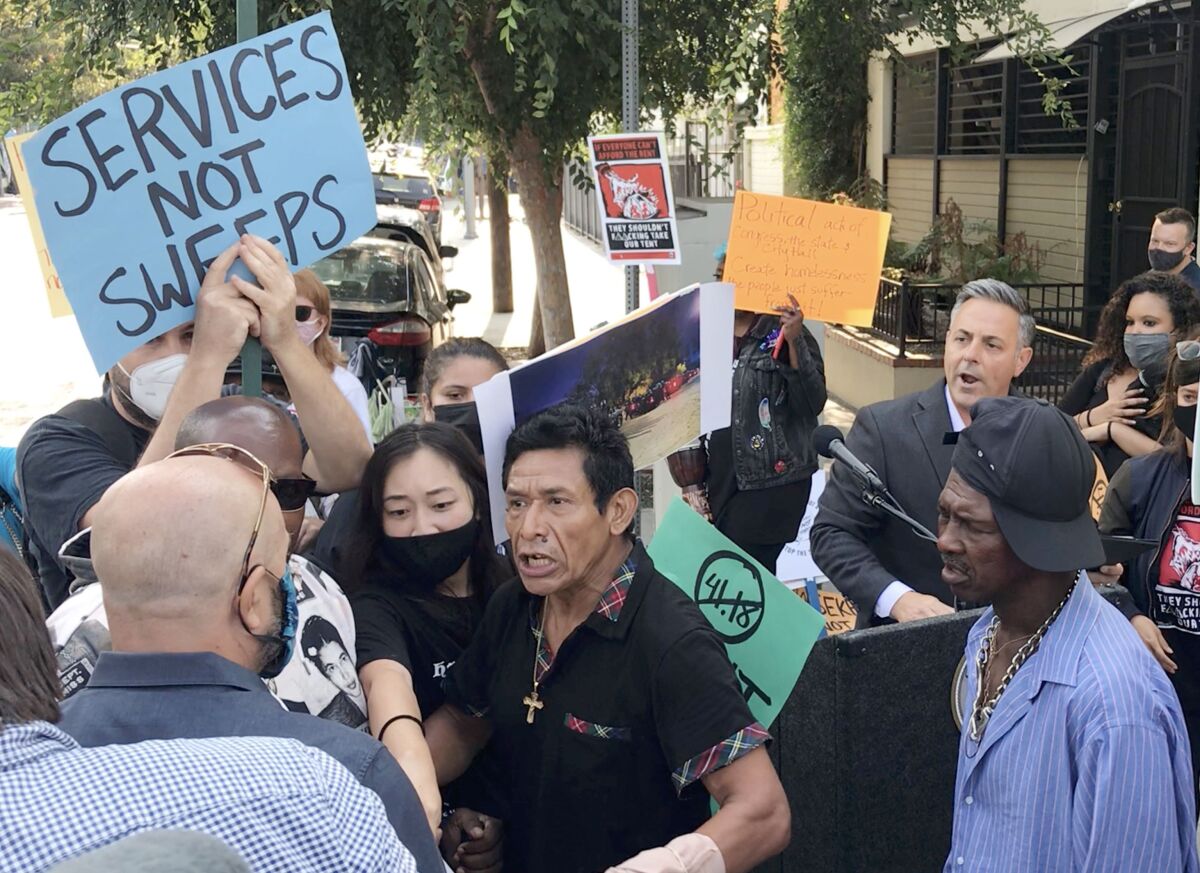 A confrontation at Los Angeles City Councilman Joe Buscaino's press conference. 