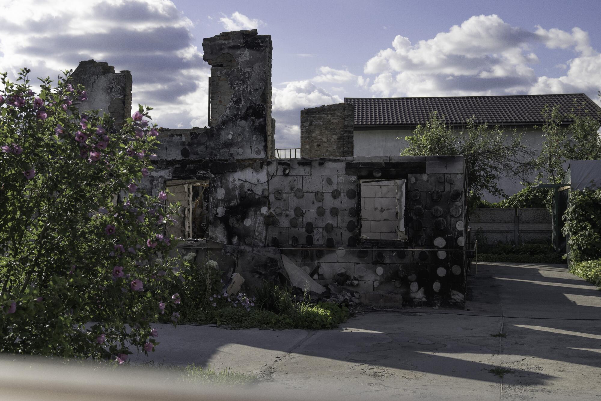 A house stands damaged 