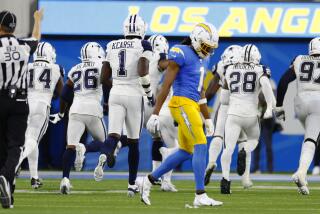Los Angeles, CA - October 16: Los Angeles Chargers Quentin Johnston walk to the sidelines after the Dallas Cowboys intercepted a pass in the final minutes of their contest at SoFi Stadium on Monday, Oct. 16, 2023, in Los Angeles, CA. (Robert Gauthier / Los Angeles Times)