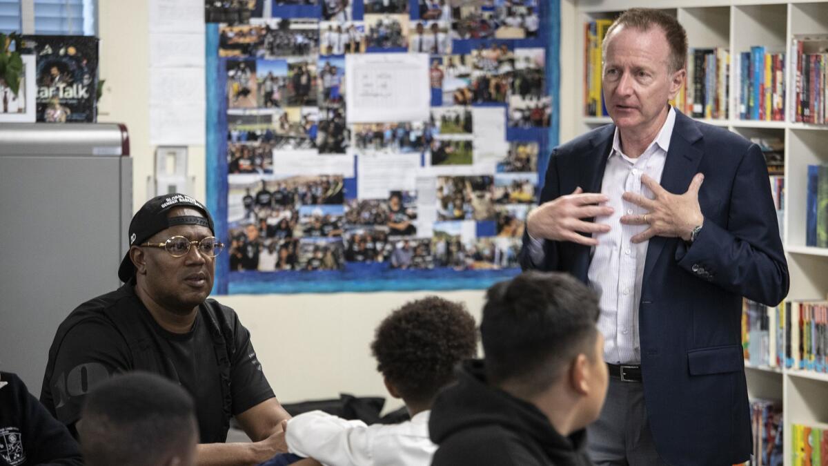 L.A. schools Supt. Austin Beutner, right, shown during a school visit in May, is taking public the district's case for its offer to break a contract negotiations stalemate with teachers.