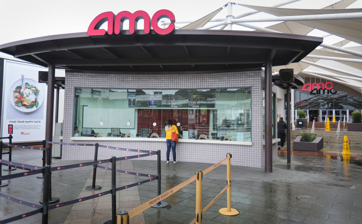 A customer at the AMC Theatres at the Westfield Mission Valley shopping center in San Diego.