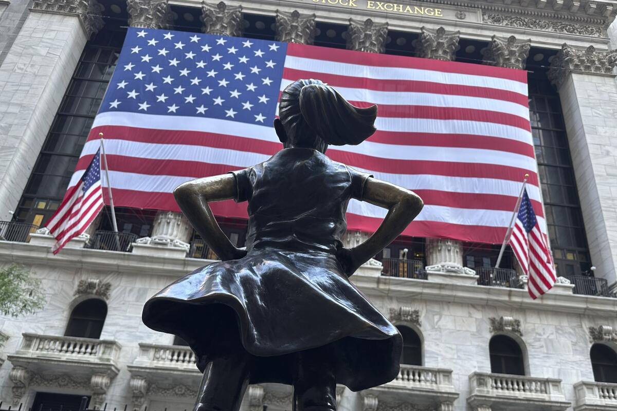 The Fearless Girl statues faces the New York Stock Exchange on July 2, 2024, in New York.
