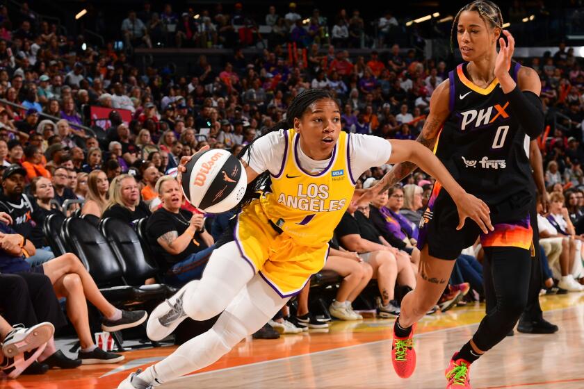 PHOENIX, AZ - JUNE 2: Zia Cooke #1 of the Los Angeles Sparks goes to the basket during the game against the Phoenix Mercury.