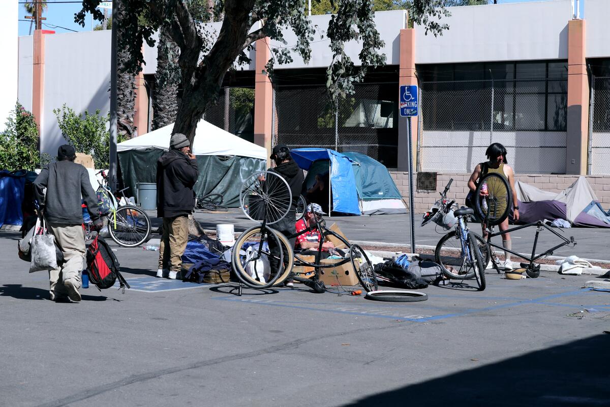 About 40 people live in El Centro Cultural de Mexico's parking lots.