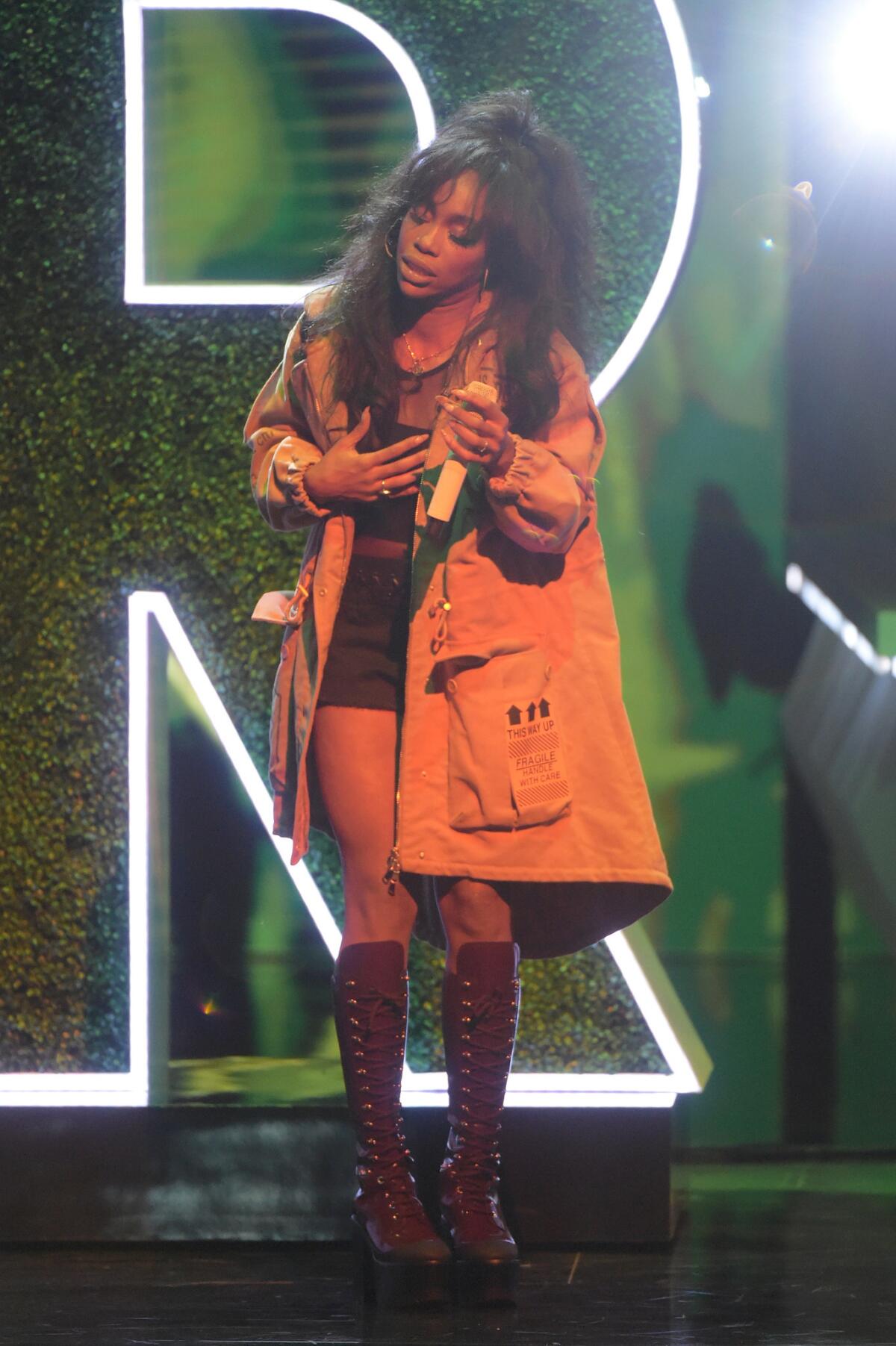 SZA performs. (Jason Kempin / Getty Images for BET)