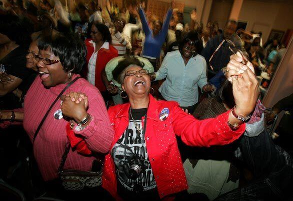 Congregants at the First AME Church celebrate Barack Obama's election as president. The church sponsored an event called "From Dream to Reality: An Election Night Watch Party."