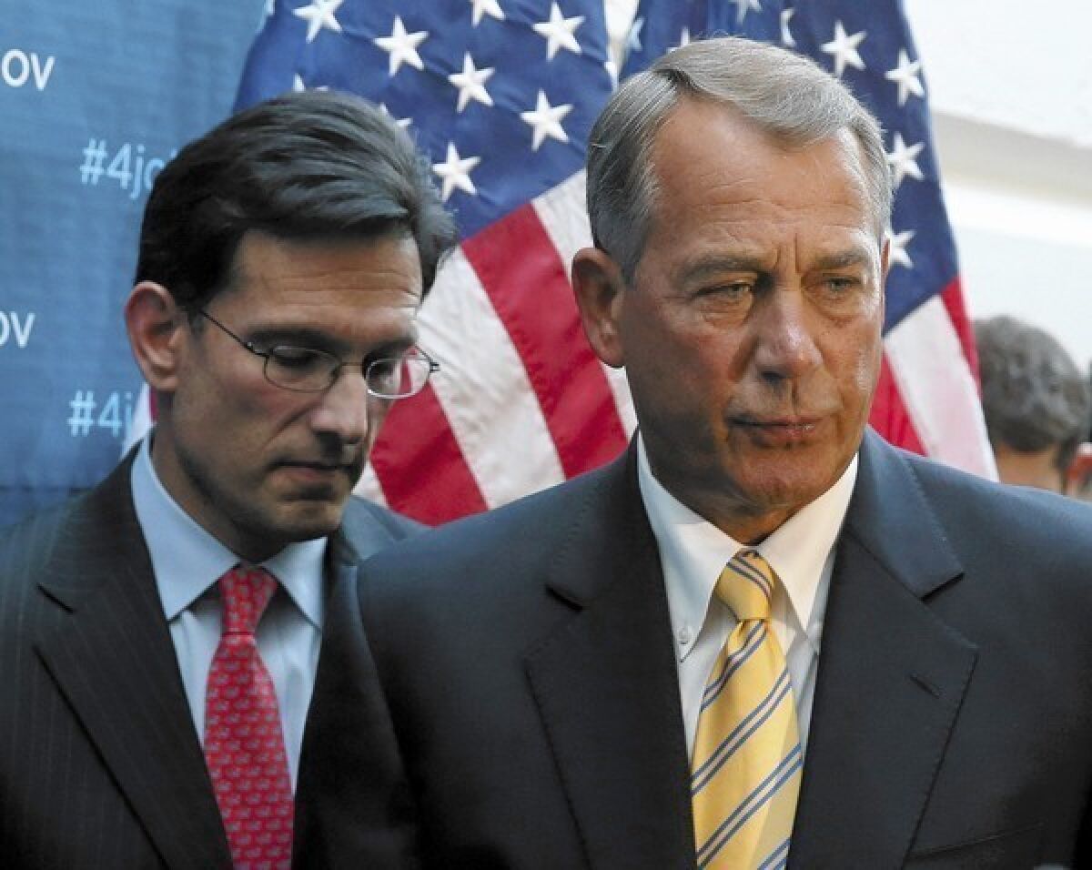 House Majority Leader Eric Cantor (R-Va.), left, and House Speaker John A. Boehner (R-Ohio) at the Capitol. "We are working on a standards or principles document" on immigration, Boehner told House Republicans at a closed-door meeting, according to an attendee.