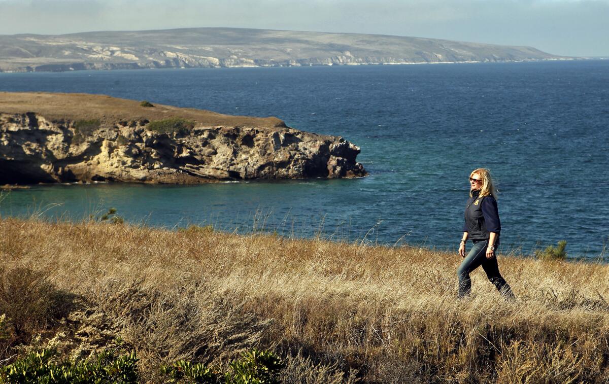In this 2011 photo, Nita Vail walks along a bluff on Santa Rosa Island, part of the Channel Islands chain.