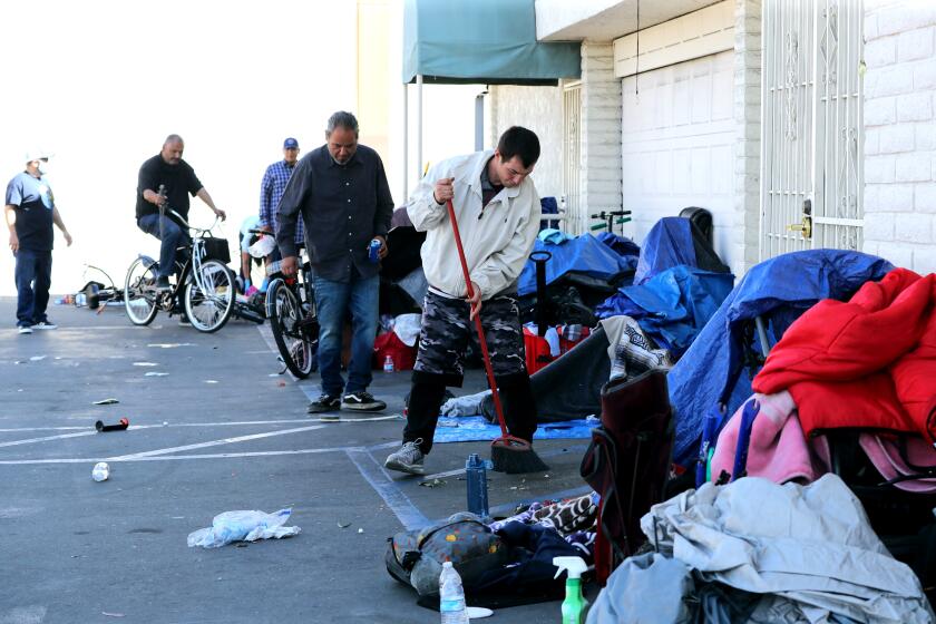 There are about 50 people living at two parking lots for the El Centro Cultural of Mexico, in Santa Ana on Wednesday, Feb. 24, 2021. Most of the 50 arrived since December, according to a spokesman.