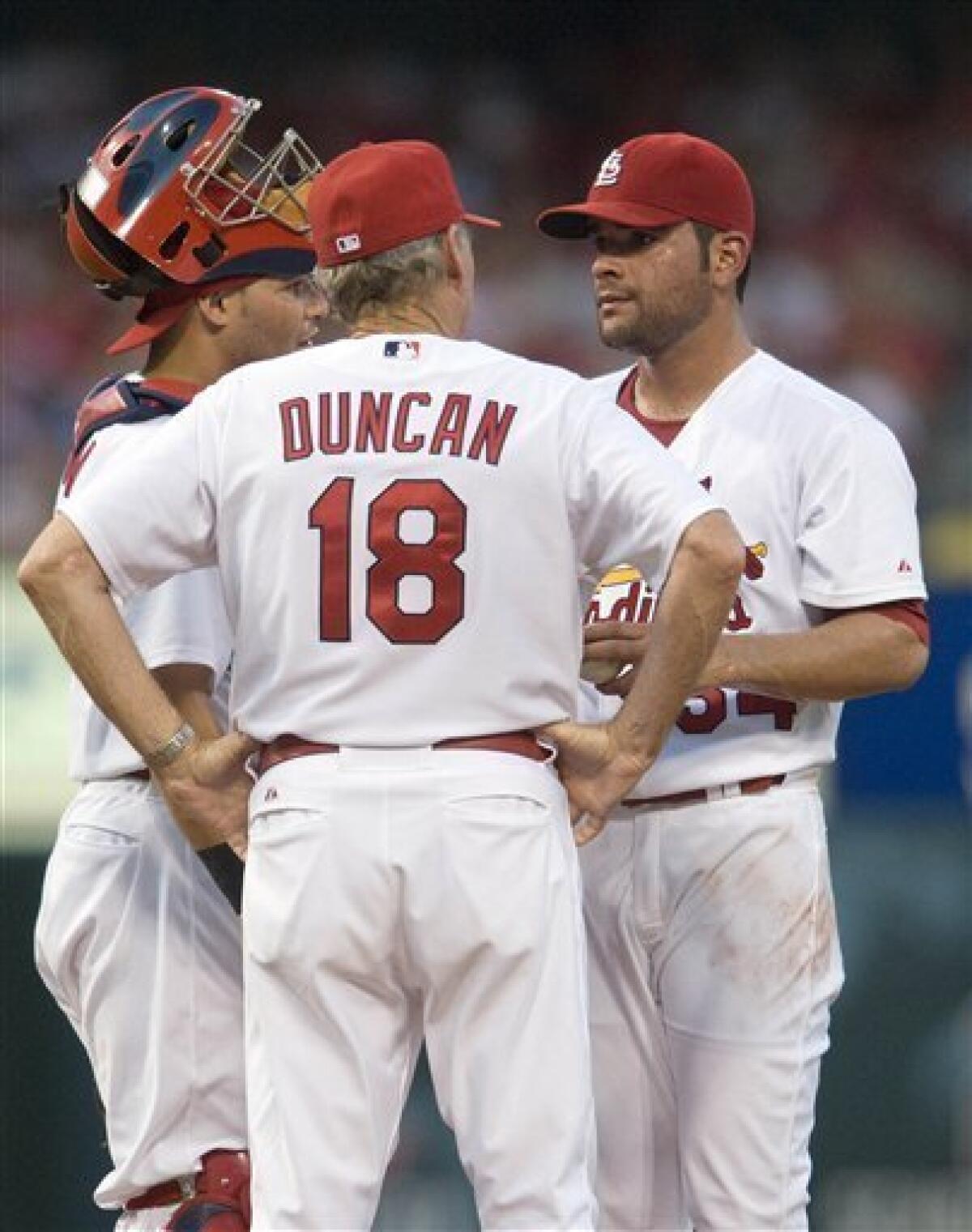 Pujols homers twice, Molina pitches as Cardinals beat Pirates 18-4