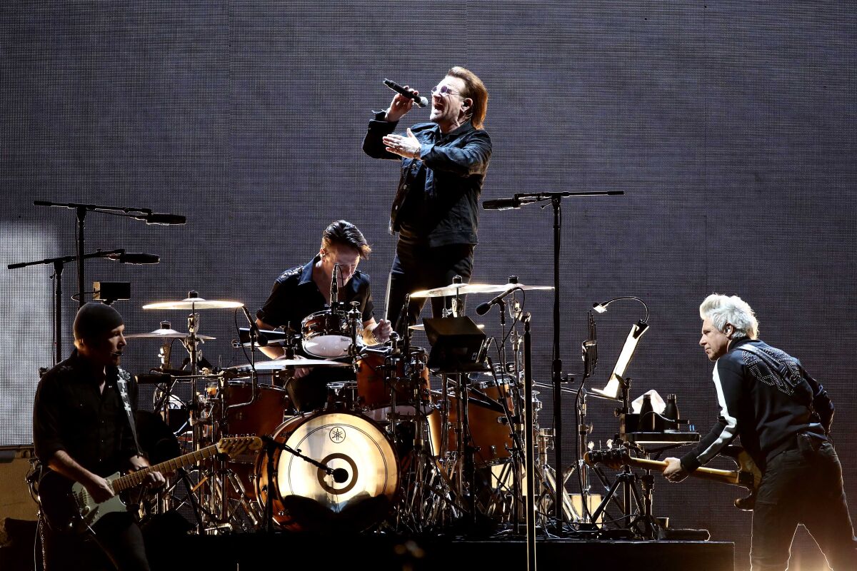  (L-R) The Edge, Larry Mullen Jr.,Bono and Adam Clayton of U2 perform at the Gocheok Sky Dome 