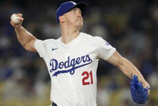 Dodgers' Walker Buehler pitches against the San Diego Padres