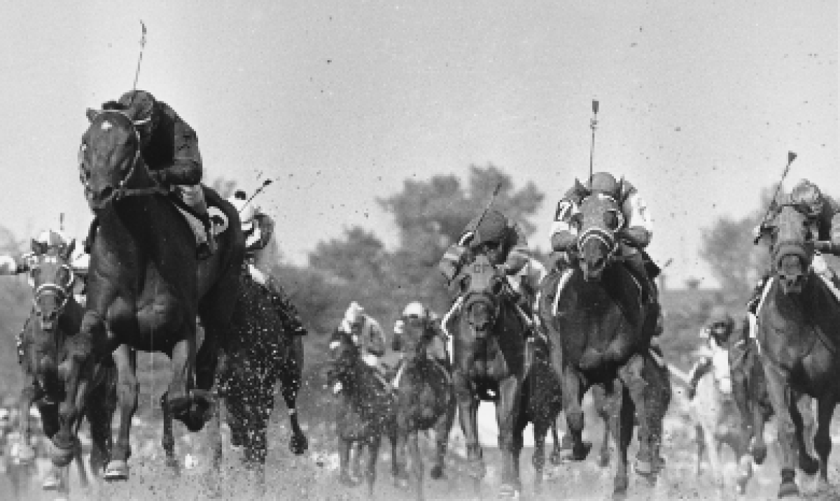 Jockey Gustavo Avilla rides Cañonero II, front left, to victory at the 1971 Kentucky Derby.