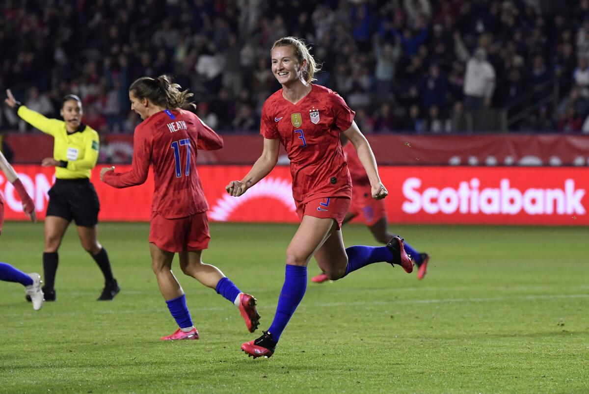 Sam Mewis, right, celebrates one of her two goals in the United States' 4-0 win over Mexico on Feb. 7, 2020, in Carson.