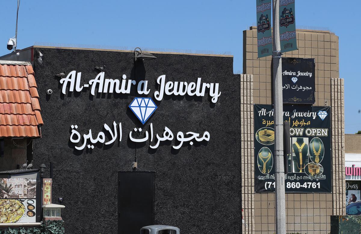 Al-Amira Jewelry's business owner has painted over the "Hijabi Queens" mural that previously covered the wall.