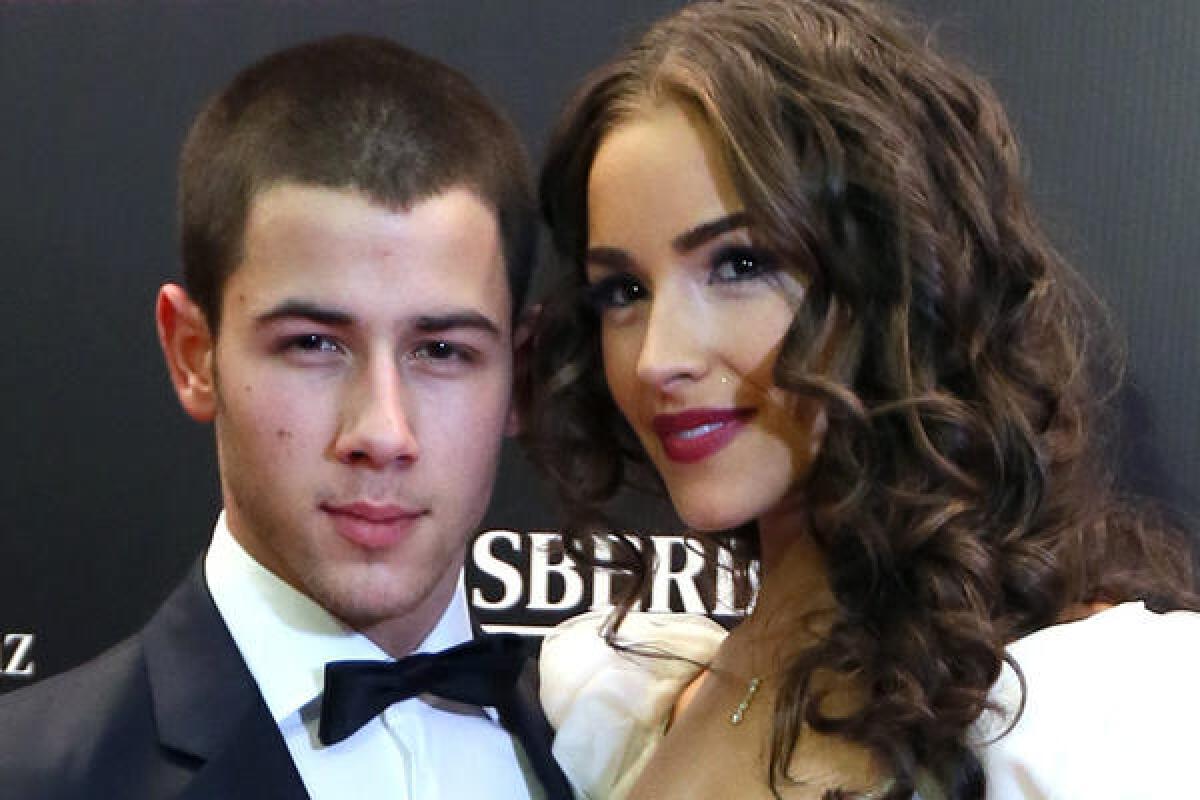 Nick Jonas and Olivia Culpo arrive for the finale of the Miss Universe 2013 competition held Saturday in Moscow.
