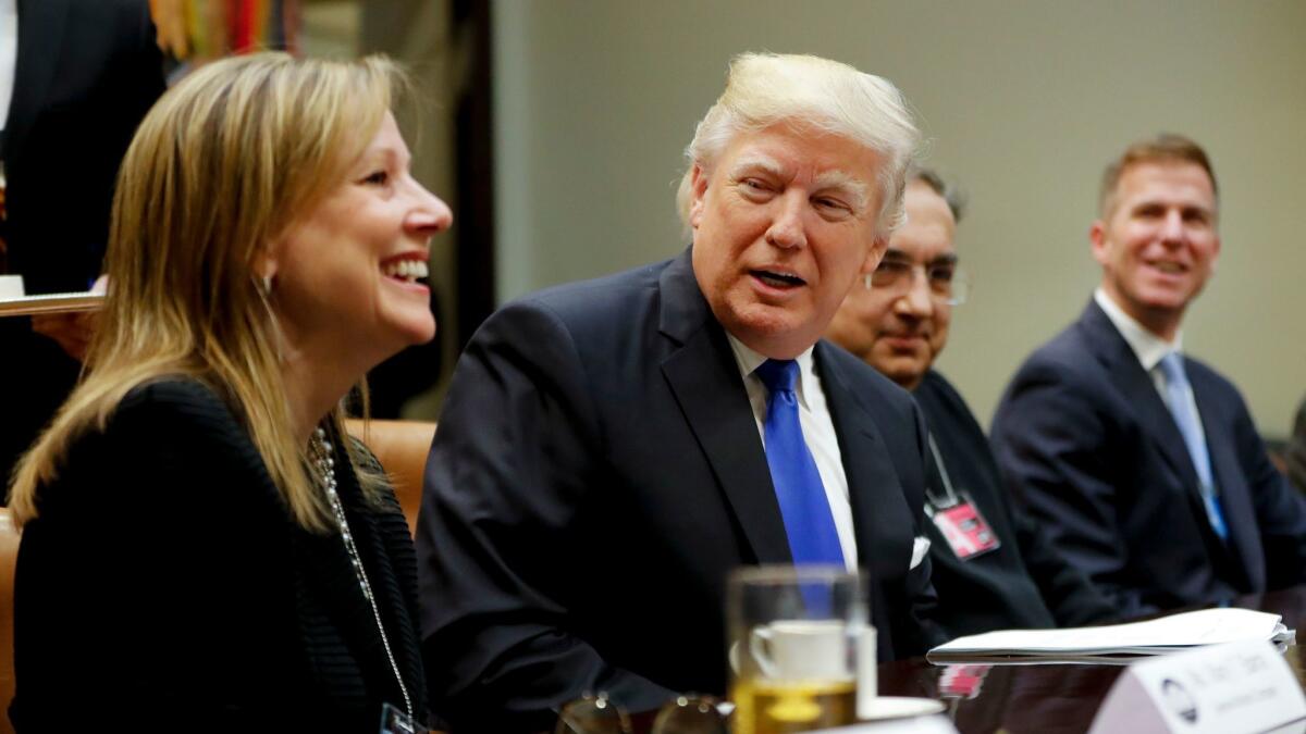 President Trump meets with General Motors CEO Mary Barra, left, and other auto executives at the White House.
