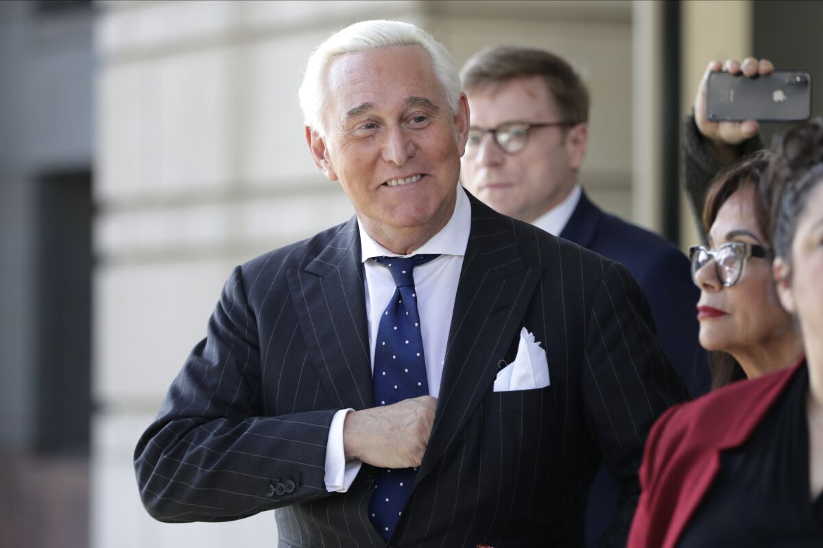 Roger Stone leaves court in Washington in 2019.