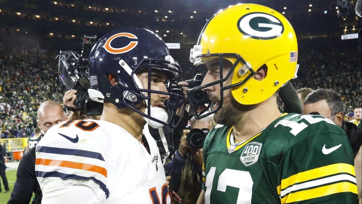 Green Bay's Aaron Rodgers, right, talks to Chicago's Mitchell Trubisky after a Sept. 9 game.