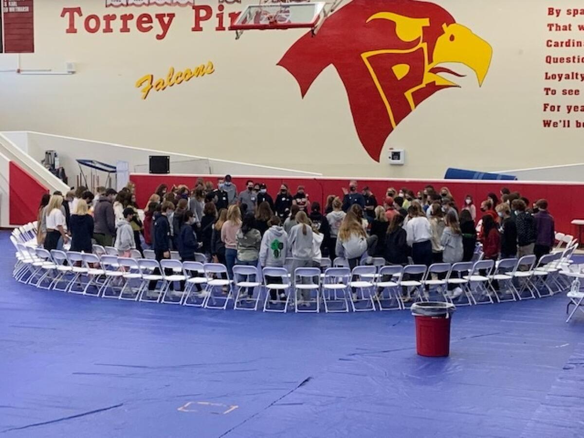 Students at the Challenge Day circle.