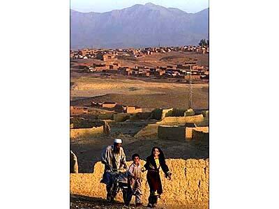 Afghan Vendor and Children