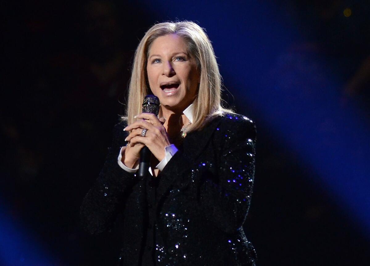 Barbra Streisand, shown at a 2012 performance in Brooklyn, N.Y., will return to the concert stage for a nine-city North American tour opening Aug. 2 at Staples Center in Los Angeles. She also plans to release a new album of duets later this year.