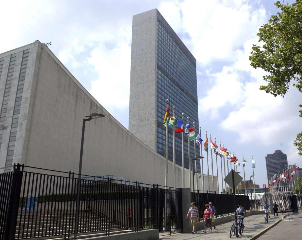 FILE - This July 27, 2007 file photo shows the United Nations Headquarters building in New York. Two Myanmar citizens have been arrested on charges alleging that they conspired to oust Myanmar's ambassador to the United Nations by injuring or killing him. U.S. Attorney Audrey Strauss said in a release on Friday, Aug. 6, 2021 that Phyo Hein Htut and Ye Hein Zaw plotted to seriously injure or kill Kyaw Moe Tun in an attack that was to take place in Westchester County. (AP Photo/Osamu Honda, File)