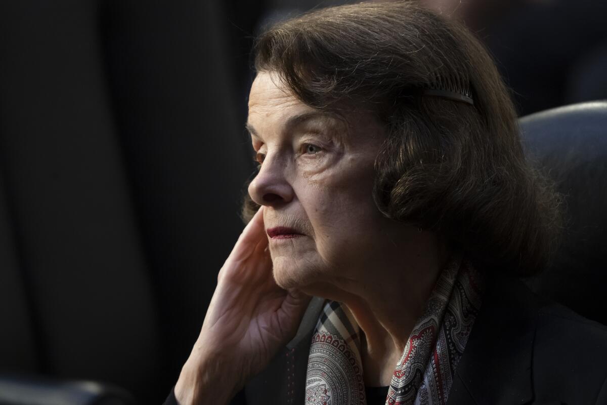 An older woman listens