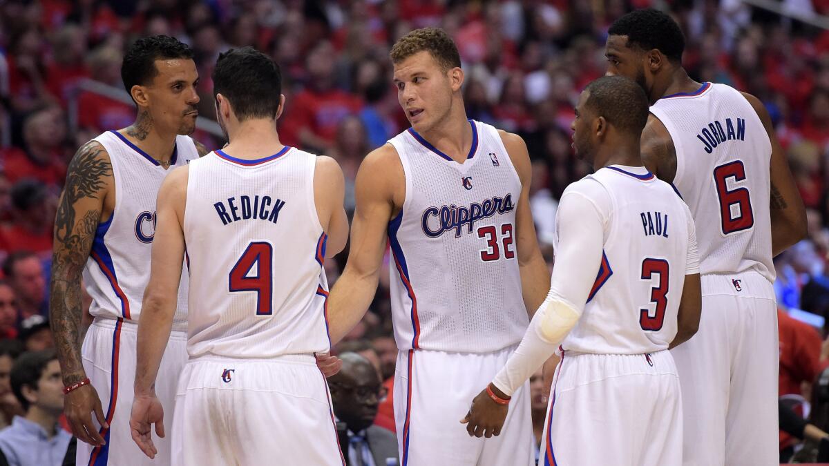 Clippers teammates (from left to right) Matt Barnes, J.J. Redick, Blake Griffin, Chris Paul and DeAndre Jordan talk during Game 6 of the Western Conference semifinals against the Oklahoma City Thunder in May.