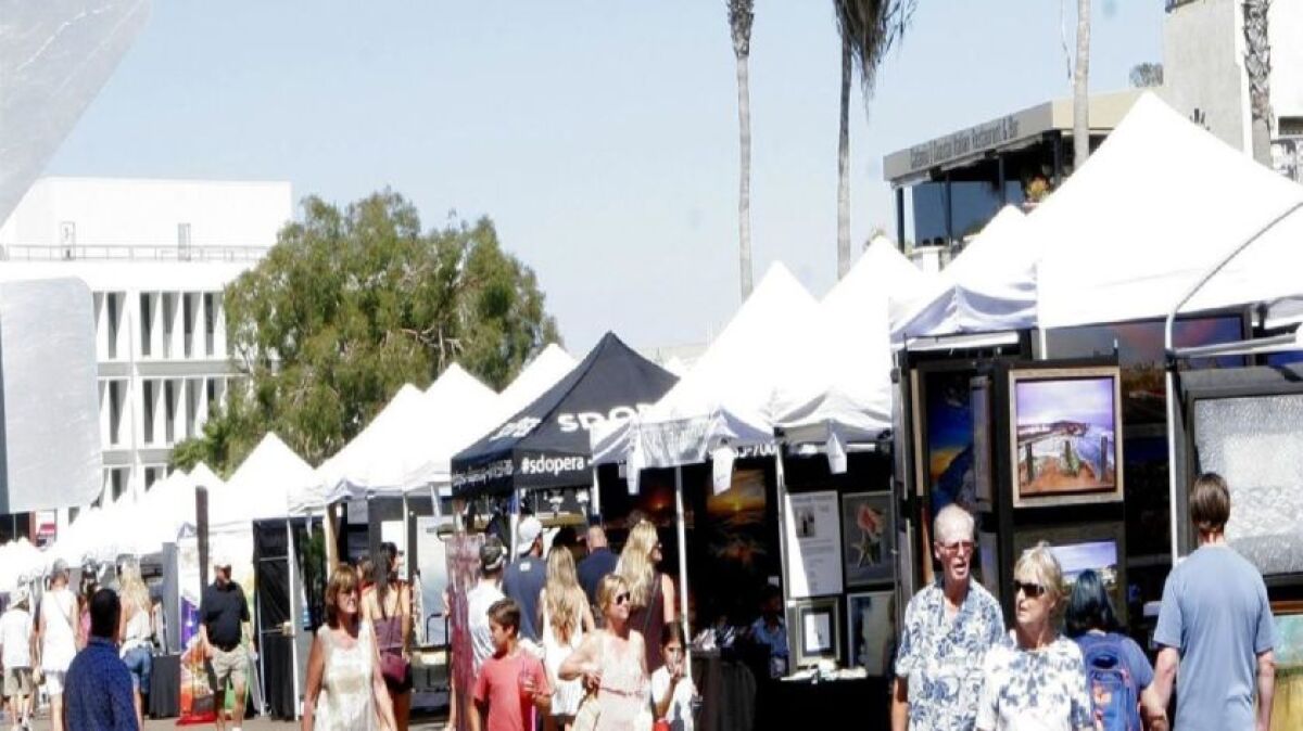 Visitors attend the 2018 La Jolla Art & Wine Festival. This year's event is Oct. 8-9 in The Village.