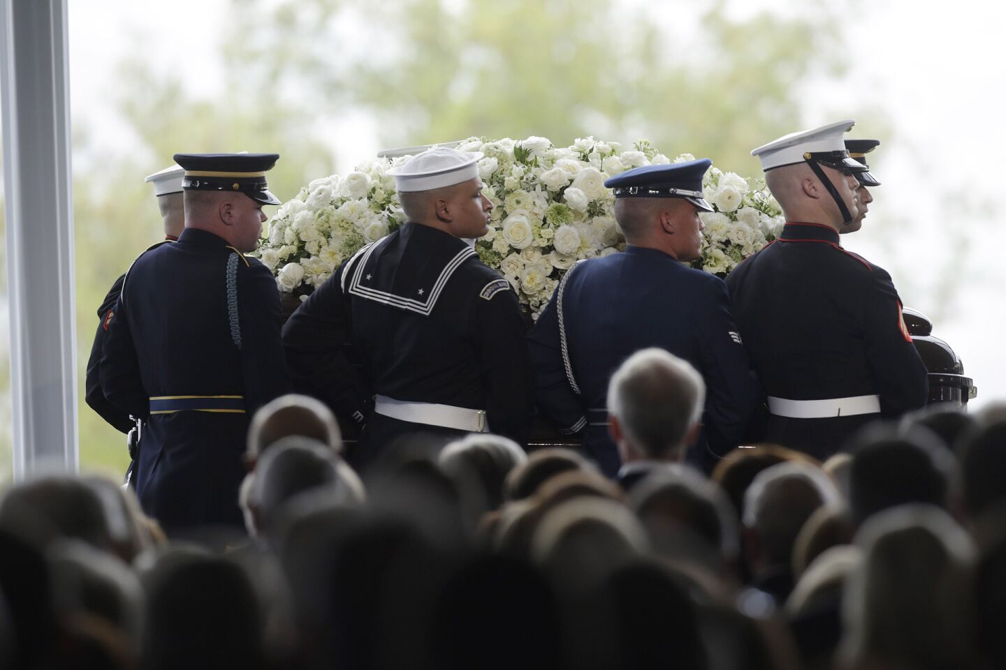 Pallbearers carry the casket of former First Lady Nancy Reagan into her funeral service at the Ronald Reagan Presidential Library in Simi Valley.