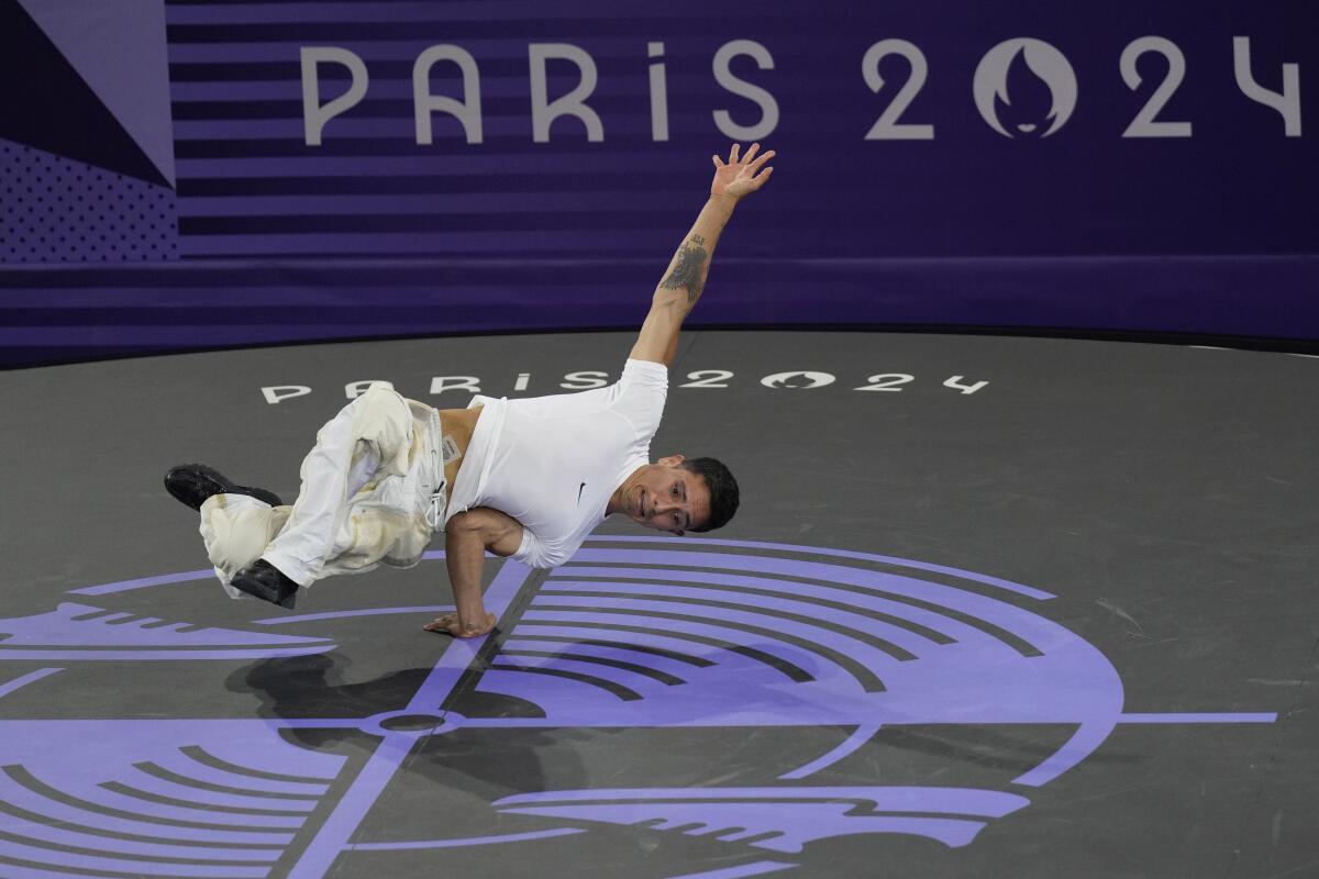 American Victor Mantalvo, known as B-Boy Victor, competes during the breaking competition bronze medal battle