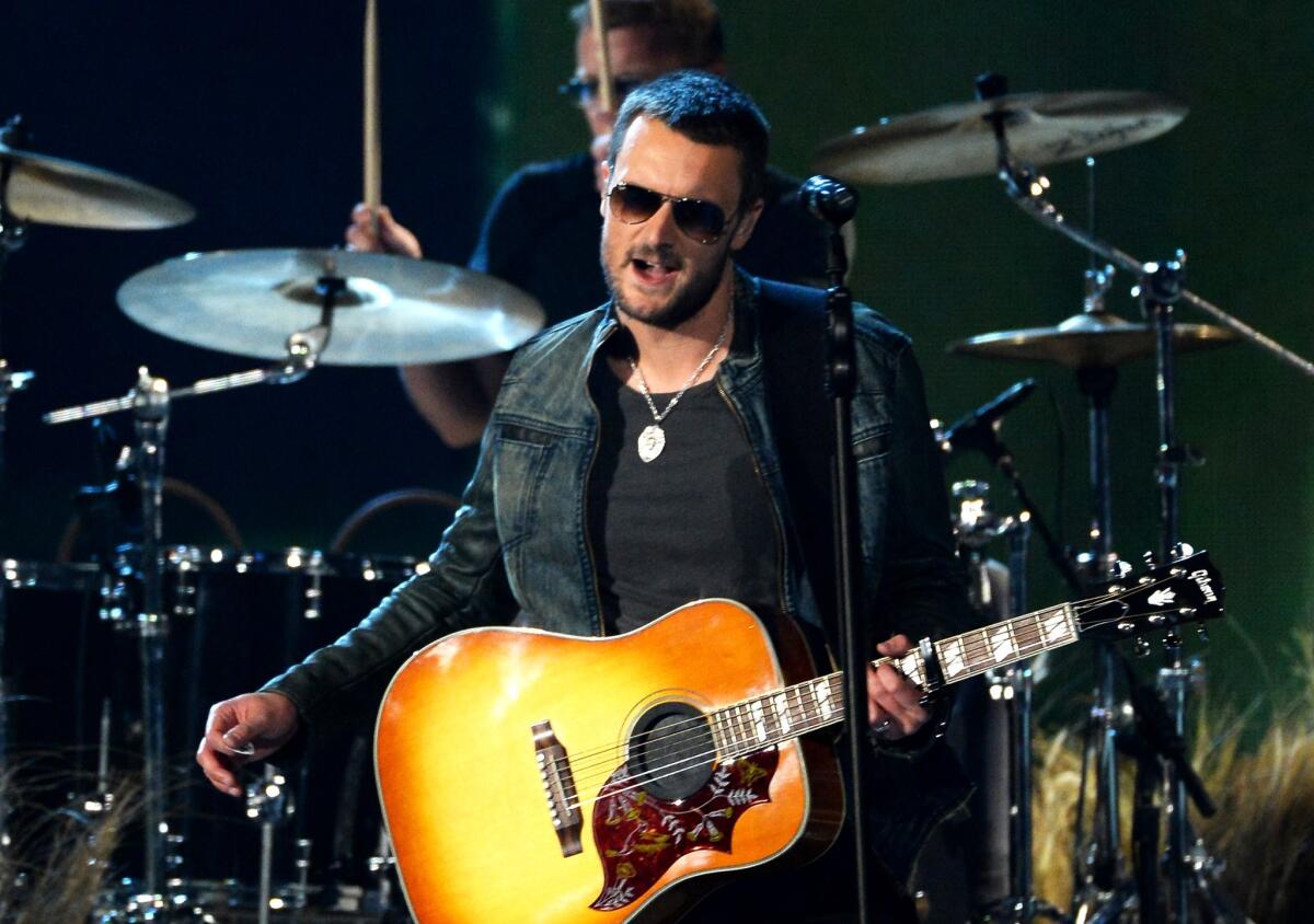 Eric Church, seen performing Sunday at the Academy of Country Music Awards, announced Wednesday that he'll tour North America this fall with Dwight Yoakam.