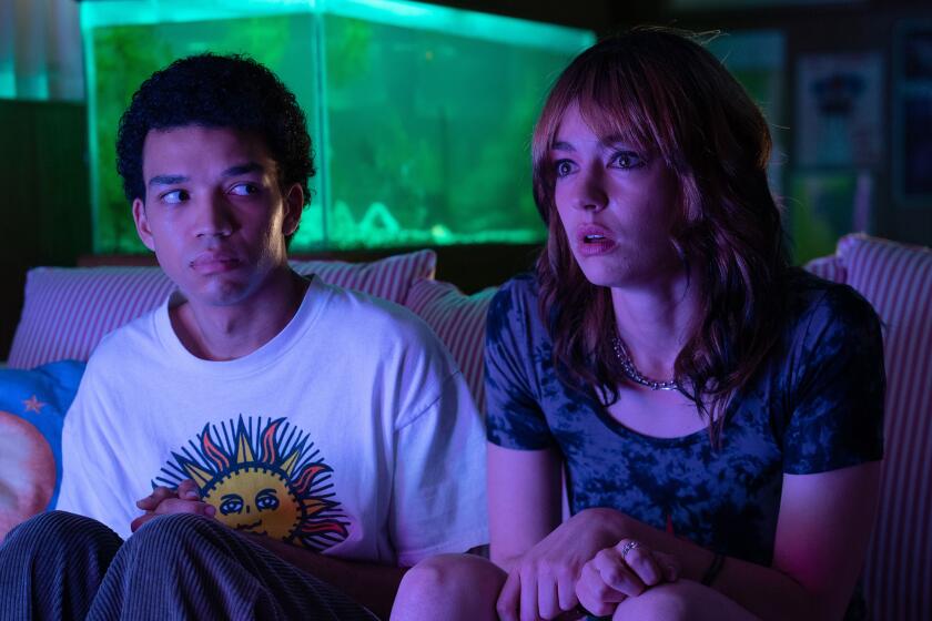 Justice Smith and Brigette Lundy-Paine appear in "I Saw the TV Glow"