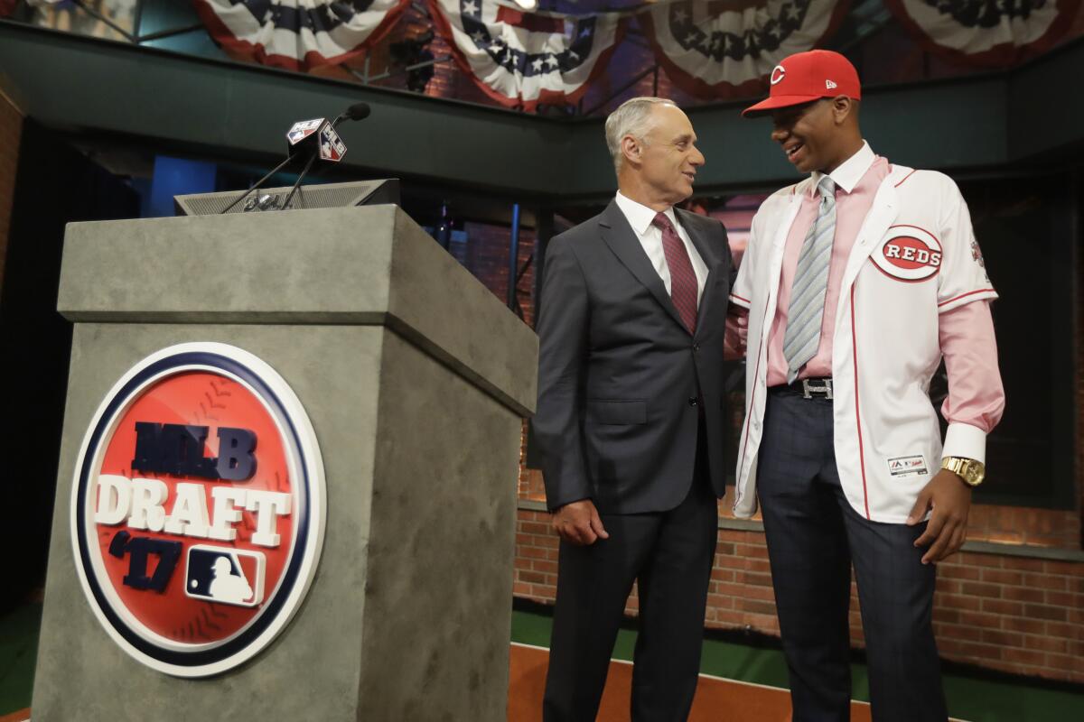 Hunter Greene, right, a pitcher and shortstop from Notre Dame High School in Sherman Oaks, Calif.