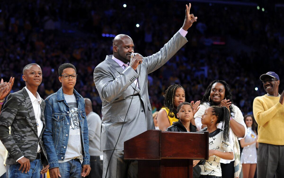 Former Laker Shaquille O'Neal addresses fans during a ceremony to retire his jersey at Staples Center on April 2, 2013.