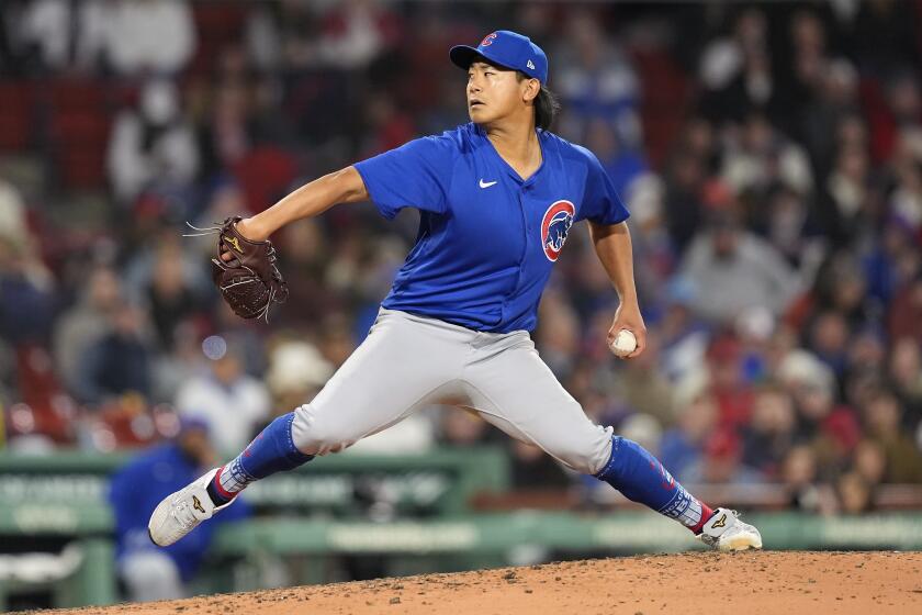 Chicago Cubs starting pitcher Shota Imanaga throws to a Boston Red Sox batter during the fifth inning of a baseball game Friday, April 26, 2024, in Boston. (AP Photo/Michael Dwyer)