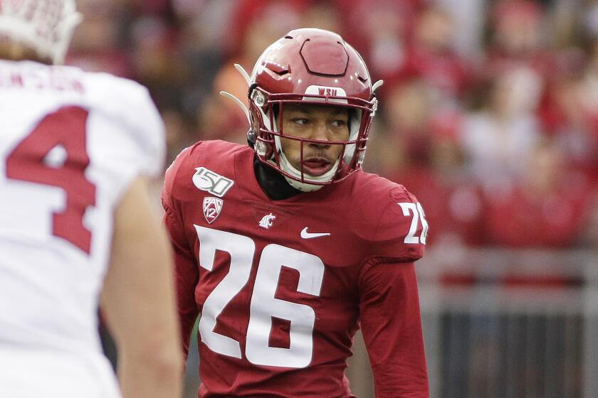 FILE - This Nov. 16, 2019, file photo shows Washington State defensive back Bryce Beekman (26) during the first half of an NCAA college football game against Stanford in Pullman, Wash. Bryce Beekman has died. Police Cmdr. Jake Opgenorth said Wednesday, Marc 25, 2020, the 22-year-old Beekman was found dead at a residence in Pullman. He declined to provide additional details and said more information would be released later by the Whitman County coroner’s office. (AP Photo/Young Kwak, File)