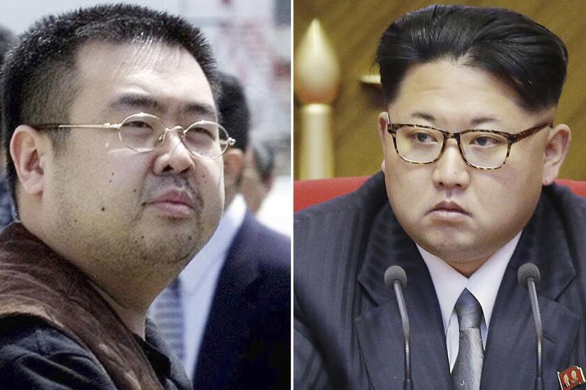 FILE - This combination of file photos shows Kim Jong Nam, left, exiled half-brother of North Korea's leader Kim Jong Un, in Narita, Japan, on May 4, 2001, and North Korean leader Kim Jong Un on May 9, 2016, in Pyongyang, North Korea. A U.S. media report says the slain half brother of North Korean leader Kim Jong Un had been a source for the Central Intelligence Agency and traveled to Malaysia to meet his CIA contact before his assassination in Kuala Lumpur International Airport in February 2017. The Wall Street Journal on Monday, June 9, 2019, attributed the report to an unidentified person knowledgeable about the matter, who said there was a nexus between Kim Jong Nam and the U.S. spy agency.(AP Photos/Shizuo Kambayashi, Wong Maye-E, File)