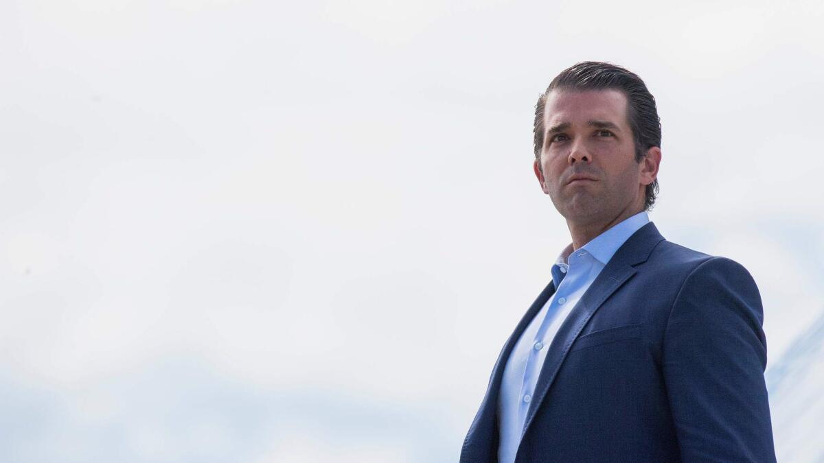 Donald Trump Jr. walks off Air Force One in Great Falls, Mont., in July.