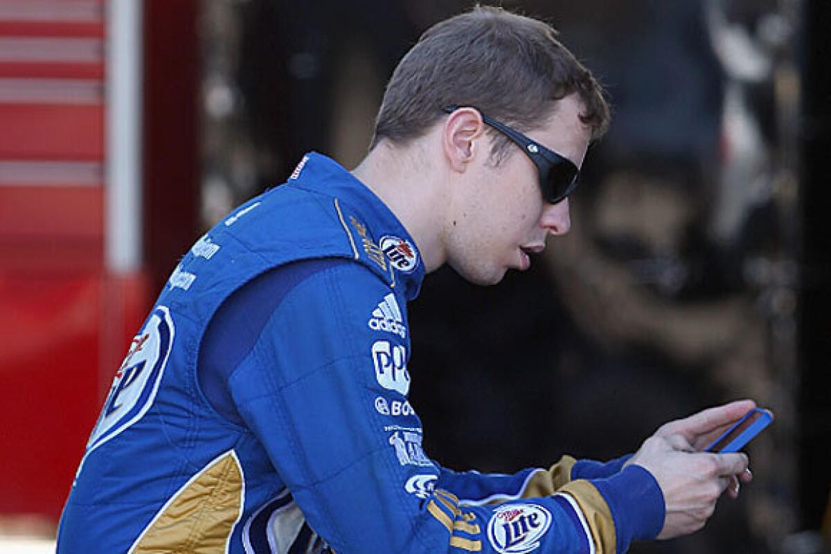 Brad Keselowski, shown during NASCAR testing at Phoenix International Raceway, was fined $25,000 by NASCAR for using a smartphone in his car on Sunday.