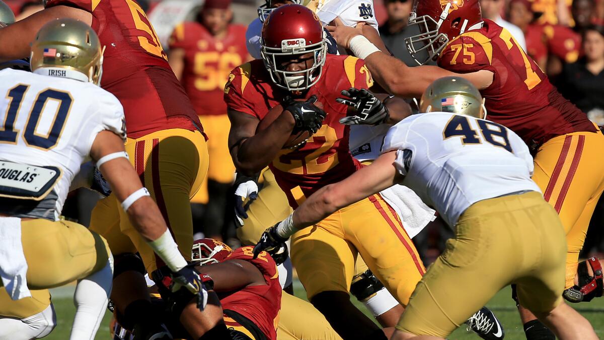 USC tailback Justin Davis carries the ball during the first quarter of the game against Notre Dame.