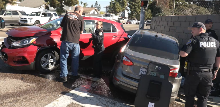 Two people were taken to the hospital after a driver fleeing Chula Vista police crashed into another car Thursday morning.