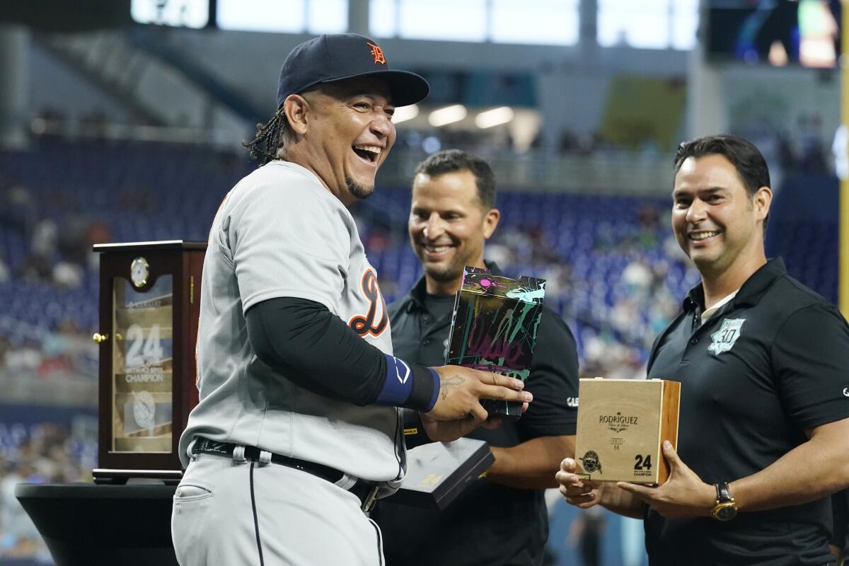 Miguel Cabrera smiles during a pre-game ceremony honoring his career